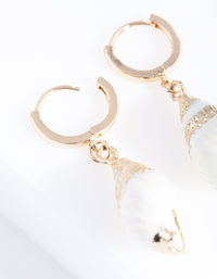 Gold Conch Shell Huggie Earrings - link has visual effect only