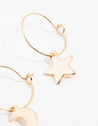 Gold Star & Moon Huggie Earrings - link has visual effect only