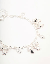 Silver Plated Alternating Cubic Zirconia & Bow Charm Bracelet - link has visual effect only